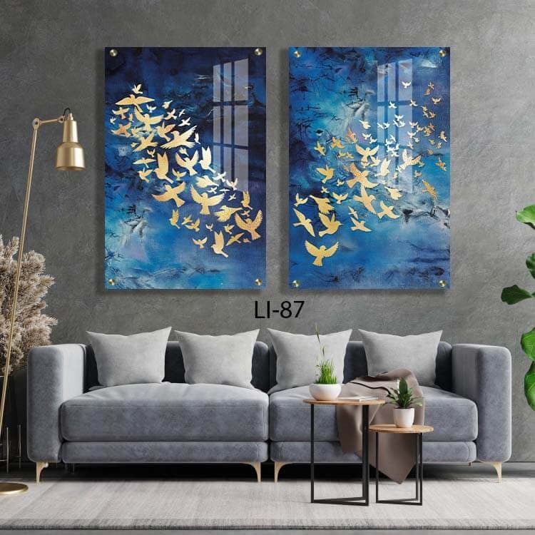 תמונות זכוכית לסלון של ציפורים זהב ברקע כחול